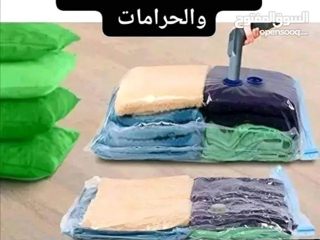 اكياس تخزين الملابس والحرامات شفط