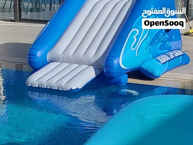 السلايدر الرائعة اجمل اضافة لمسبحك الخاص ومتعة الالعاب المائية من شركة INTEX الأمريكية