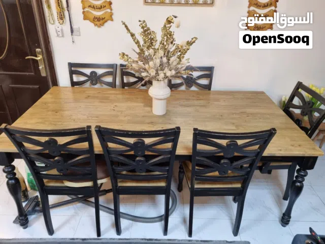 طاولة سفره للمنزل بني الون مع سبع كراسي