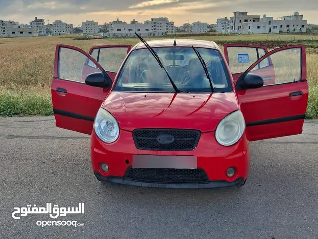 سياره كيا مورنينج حمرا