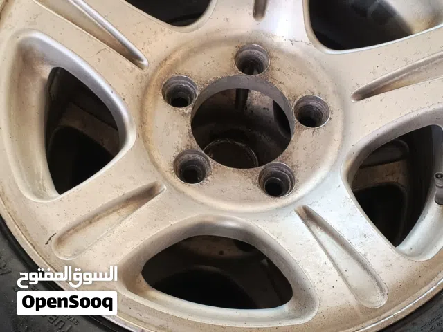 جنط 14 باص ميتسوبيشي h 100  مع كاوشوك 185R14