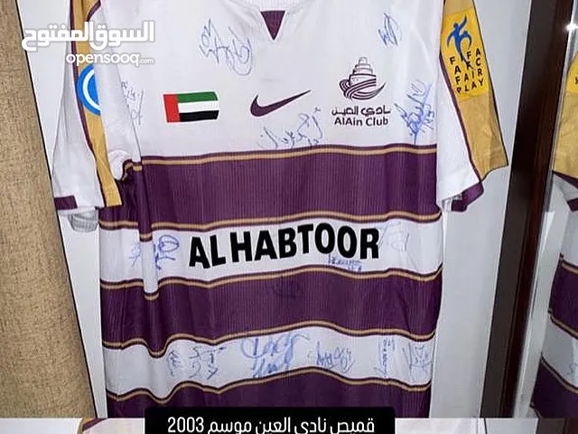 تيشرت بطولة انديه اسيا 2003 موقع من جميع الاعبين العين