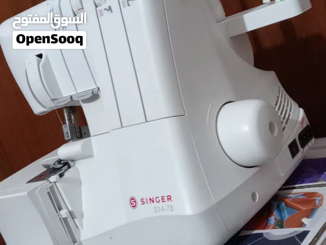 مكينه اوفر نوعيه سنكر جديده مامستخدمه أربع بكرات مع ابرتين وكص
