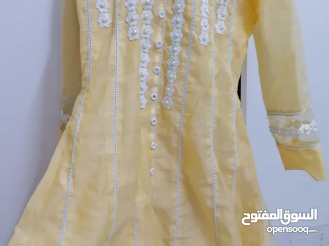 Pakistani casual dress with dupatta and dress.