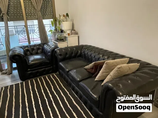 طقمين كنب جلد خشب ثقيل جدا
