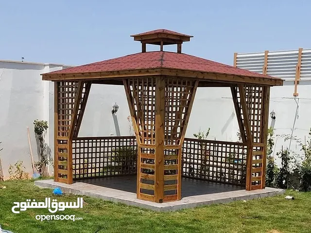 المظلة الذهبية لأعمال الخشب المعالج