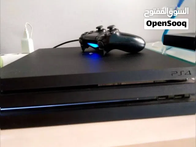 PS4 PRO 1TB WITH 2 JOYSTICK & ASUS MONITOR AND FREE GAMES