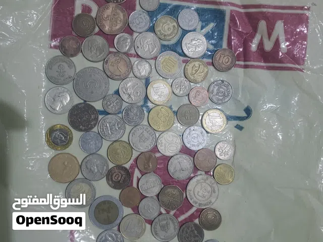 عملات معدنية قديمة وفضية