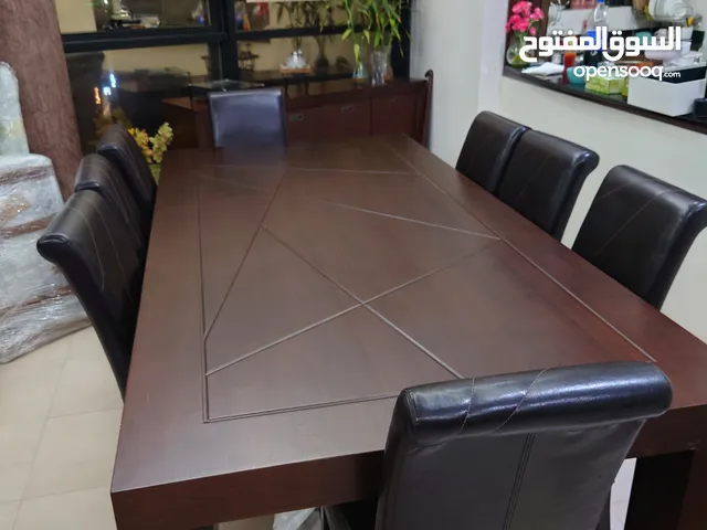 dining table with 8 leather chairs with chest in perfect condition