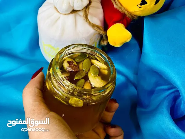 عسل ويني الاصلي بالاعشاب والمكسرات