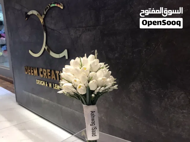مسكات ورد توليب صناعي على الضمان