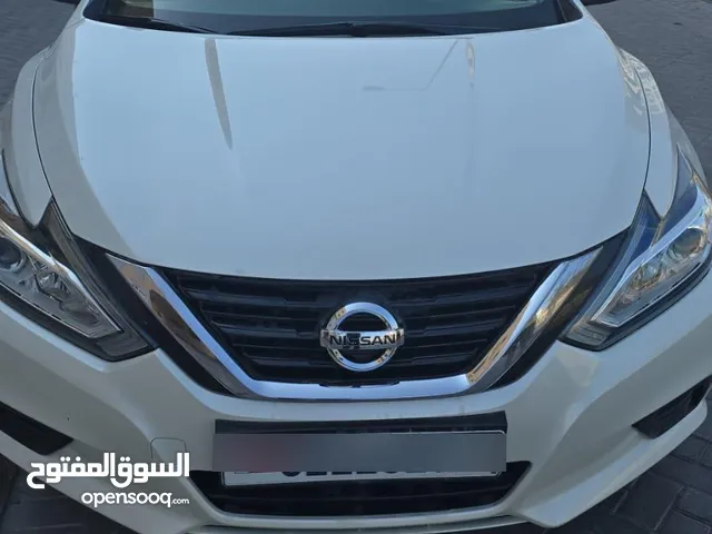 Nissan Altima 2.5 S 2018 base model with GPS and rear camera,insurance and passing till Sep 2025.