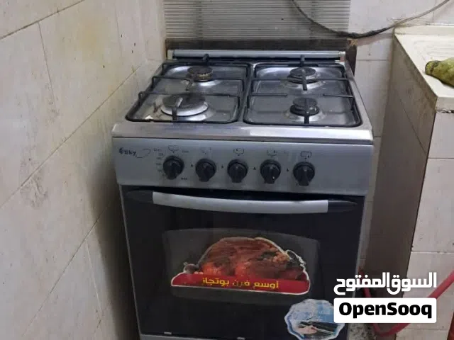 بوتاجاز مع اسطوانة غاز ومنظم وخرطوم