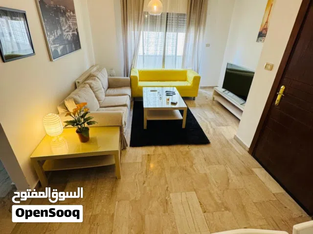 2-Bedroom Fully-Furnished Apartment with Balcony for Rent in Deir Ghbar, Amman - Jordan