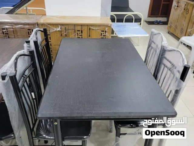 طاوله طعام خشب متين ب 4 كراسي