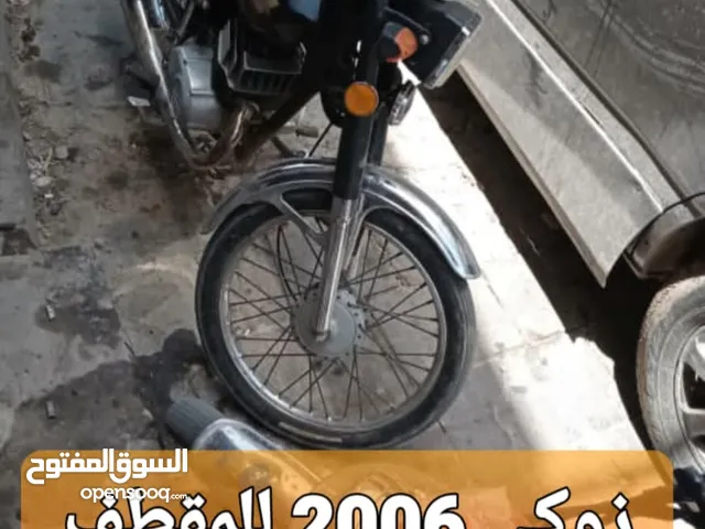 سوزوكي AX100 موتر حالي للمقطف