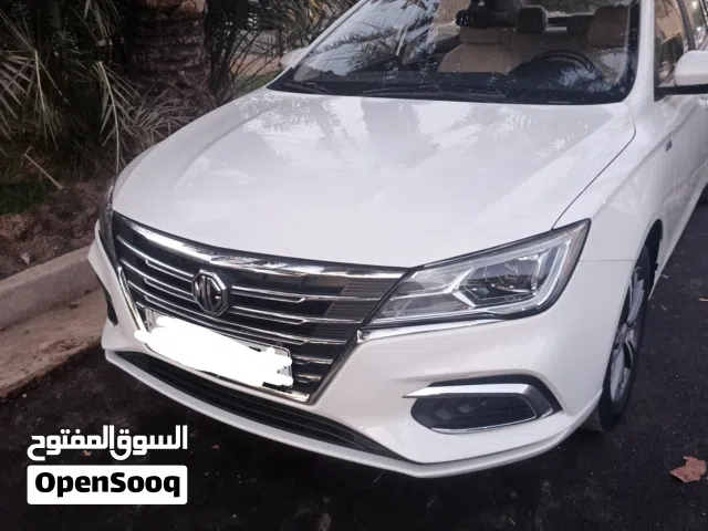 ام جي 5 موديل 2024 ماشية 21 الف رقم بغداد  باسمي مكفولة وداخل ضمان الشركة