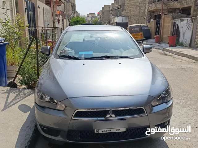 لانسر 2016 شركة عامه مكفوله ماشيه 26 الف. كير محرك تبريد كشر مكفول