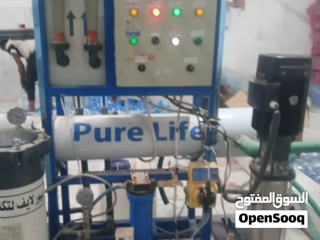 مصنع تحلية مياة معدنية مع ماكينة نفخ قوارير بلاستيكية مع قوالب متعددة+ كمبرسر 40 بار..مستخدم نظيف