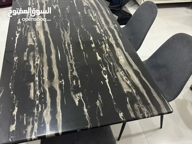 IKEA TV unit Black and 4 seater black marble dining table