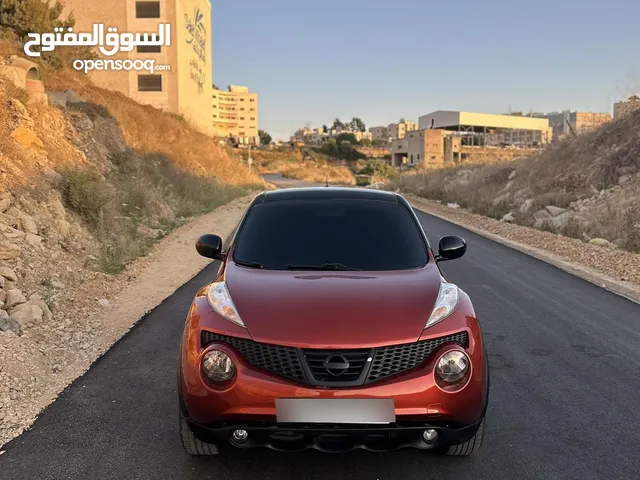 نيسان جوك 2012 محرك 1.6 توماتيك جير مطور 100% ع الفحص خالية من الضربات مغير لون على نضاف يد2