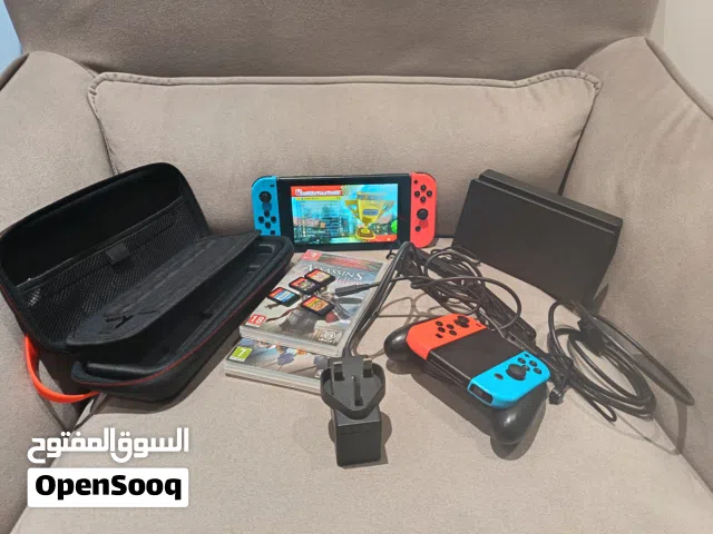 Nintendo switch with accessories and games