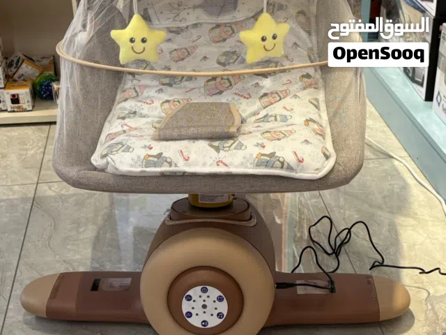 سرير أطفال هزاز كهربائي