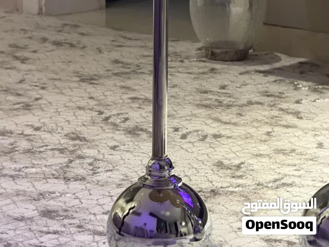 طبلات لون فضي مبير و صغير والاخرئ اسود