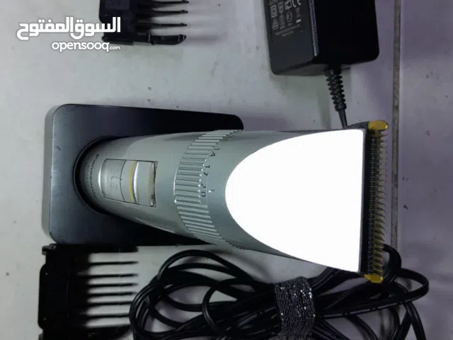 ماكينة بانسونيك لتهذيب الشعر