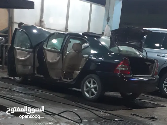 سياره للبيع تويوتا كورولا 2004 ممتازه كل شي تمام جير مكينه شاصي مكيف بيمه جديده
