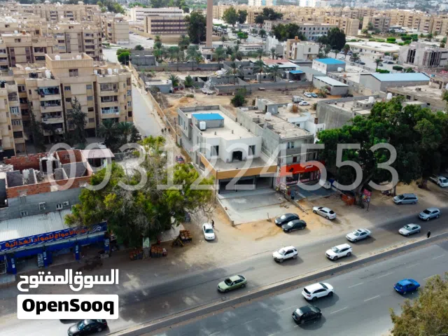 مبنى تجاري متكامل على الطريق الساحلي تاجوراء للايجار بسعر منافس