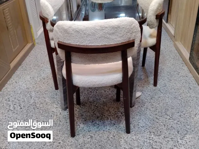 ترابيزه سفره 120سم ف 70سم و4كراسي برواز   خشب زان قرصه كبس ثه   ملاحظه الترابيزه  ثابته مش فك وتركيب