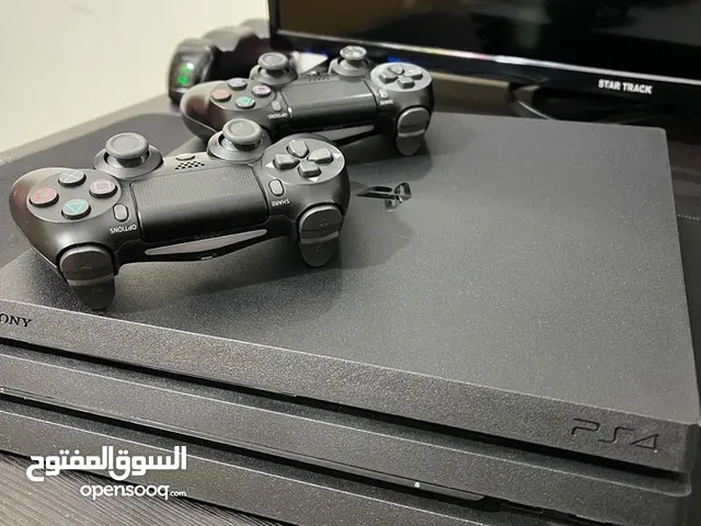 PlayStation 4 Pro + 3 Controllers + 3 Games + Charging Base / Very clean and perfect inside and out
