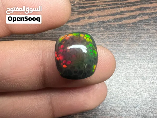 حجر أوبال أثيوبي أسود فل فاير طبيعي مع شهادة natural untreated black Ethiopian fire opal stone
