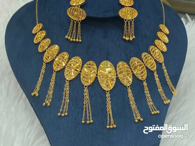 طقم ذهب عيار 21 ذهب