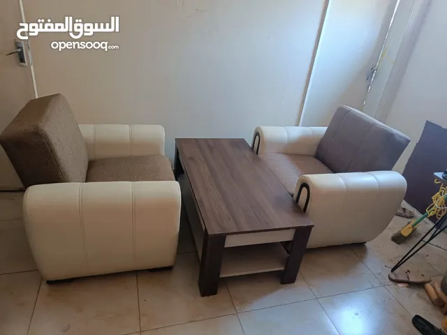 sofa single single two piece with centre table