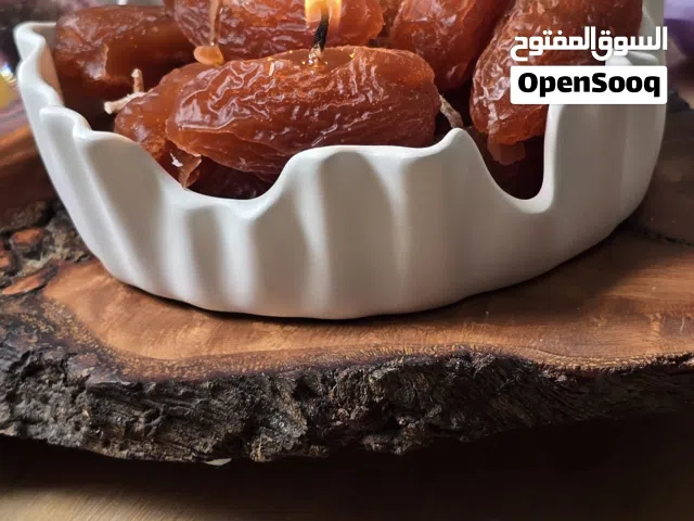 شموع بشكل تمر توزيعات فخمة للمناسبات شموع يدوية مميزة