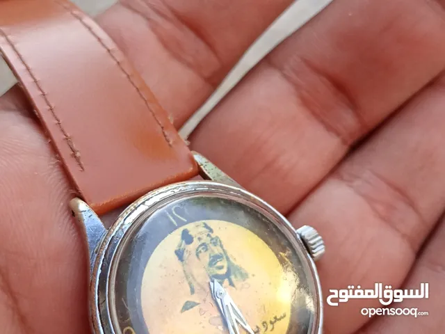 ساعة مصورة ملك السعودية
