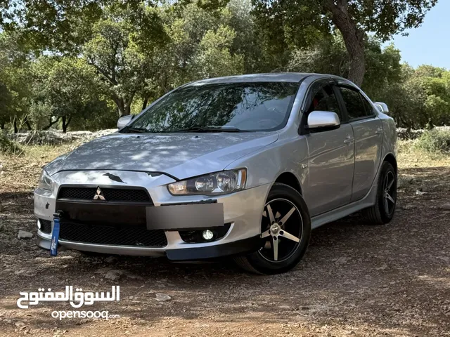 ميتسوبيشي لانسر 2013 EX لون سلفر فحص جيد قصعات خلفي مضروب مضروب امامي السياره بالصلاة عالنبي