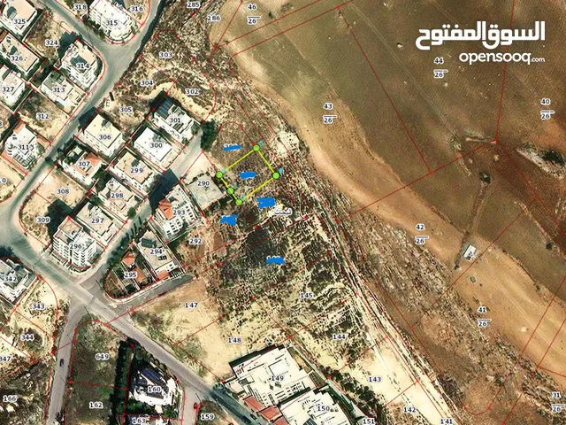 ارض غرب عمان البحاث مربعة الشكل على شارع 14 متر