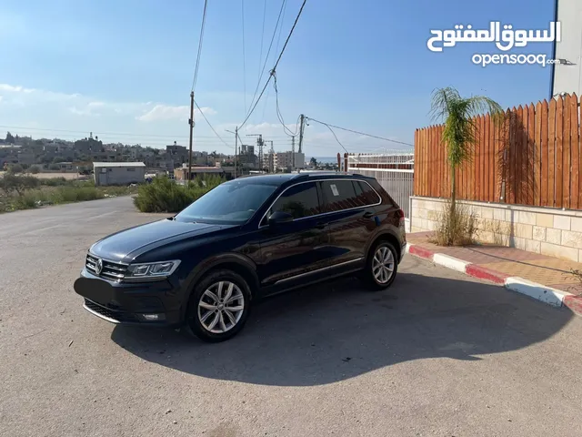 جيب تيجوان بنزين ماطور 2000 صنع شهر6 2020 ولا غرام بوية ترخيص+تأمين شامل سنة كاملة لشهر 10/2026