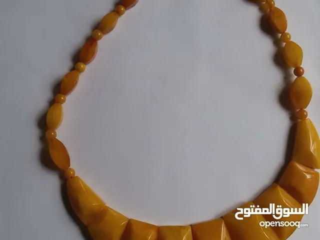 قلادة كهرب نسائيه ملكيه من احجار الكهرب القديمه