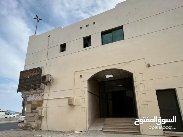 بناية ارضى + اول للبيع فى مويلح التجاريه على شارع الشيخ محمد بن زايد Ground floor + first floor buil