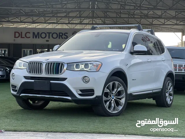 BMW X3 2017M سيارة مميزة باللون الابيض الخارجي والبيج الفاخر مع تطعيمات باللون الاسود DLC MOTORS