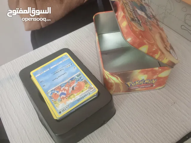 ( مجموعة من بطاقات البكيمون جديدة للبيع بسعر رخيص مجموعة نادرة جدا و تضمن علبتها الأصلية معها )