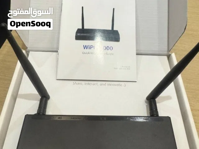 wePresent WiPG-1000 device for meeting rooms, home TV, Projectors
