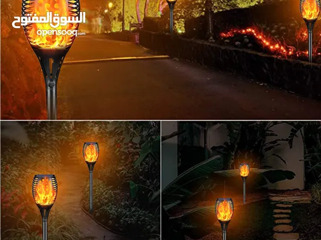 عامود  ديكور  شكل شعلة النار   يعمل على الطاقه الشمسيه يضىء ذاتيا عند غروب الشمس