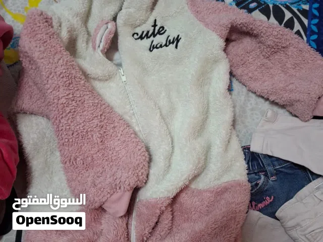 مجموعة ملابس استعمال كالجديد