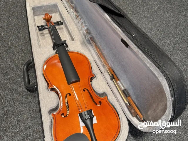 كمان مصنوع من خشب بالكامل ومفاتيح خشب مع كامل اغراضه فقطط
