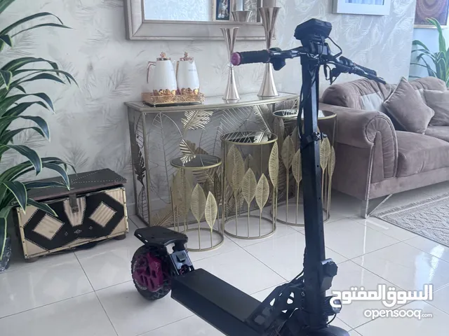 سكوتر كهربائية محركين بطاريه ليثوم 21am 52 فولت محركين بقوه 3000واط